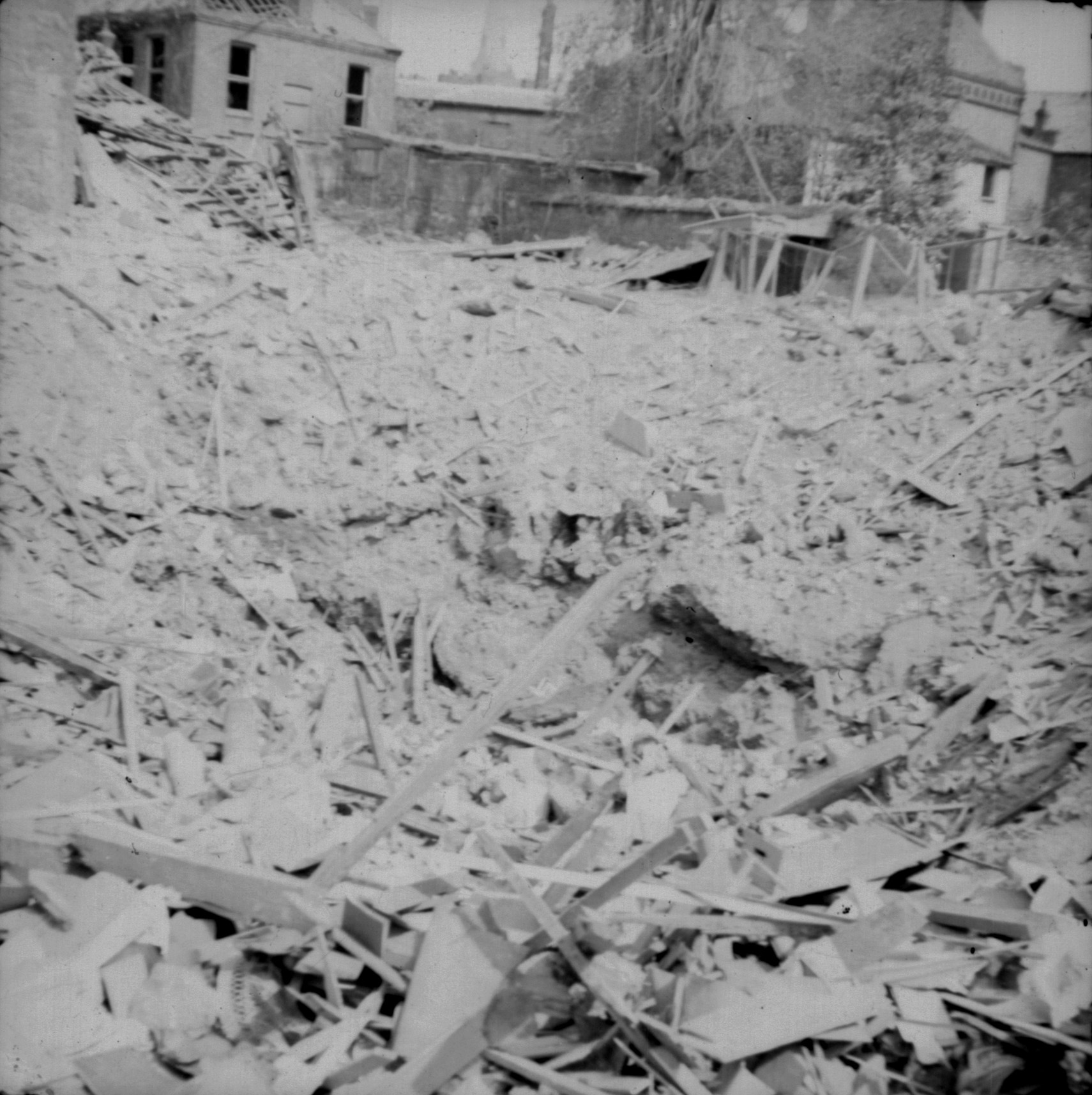 The crater on site of Lodge. Exeter. May 1942