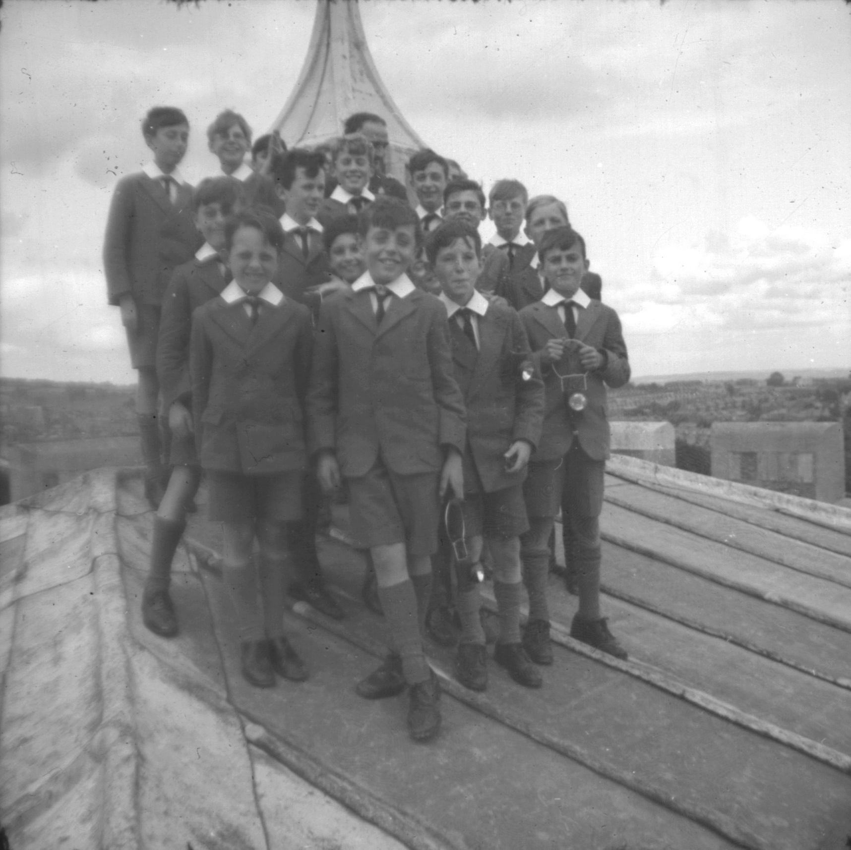 Group of boys on Cathedral Tower with E.R. Hart, Head Virger. August 1941.
